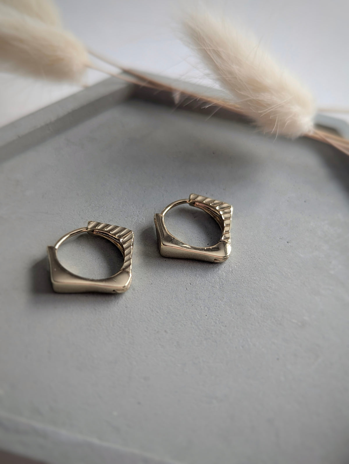 Boucles Éclipse Carrée